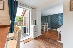 Open Plan Access From Kitchen to Family Room- click for photo gallery